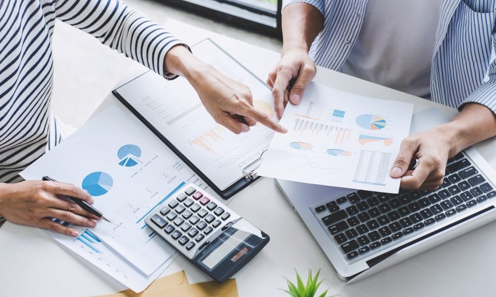 business-team-collaboration-discussing-working-analysis-with-financial-data-and-marketing-growth.jpg