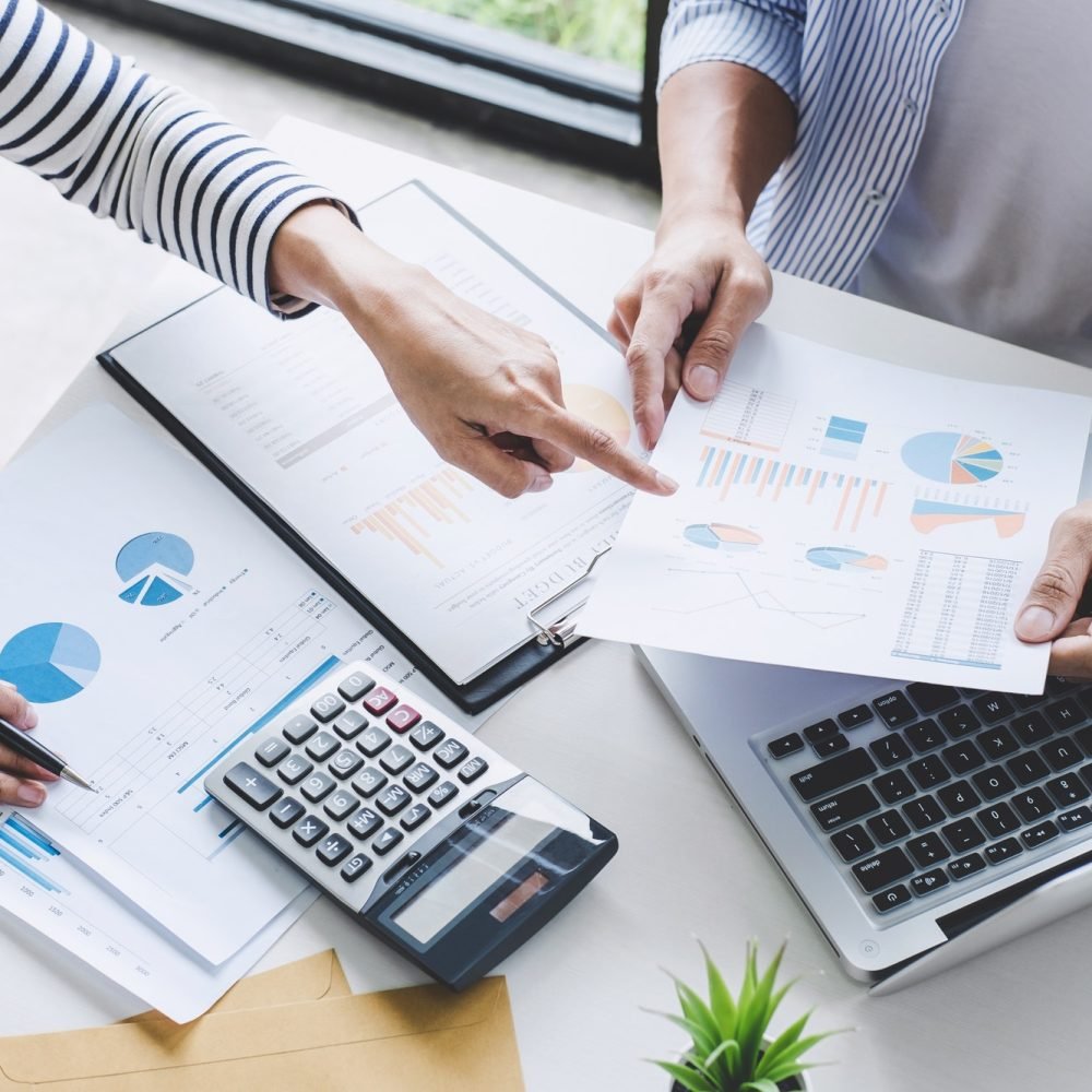 business-team-collaboration-discussing-working-analysis-with-financial-data-and-marketing-growth.jpg